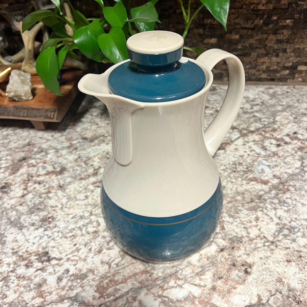 Elegant Blue and Cream Ceramic Pitcher